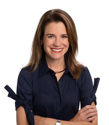 Portrait of Ashlie Gardner, REALTOR®.